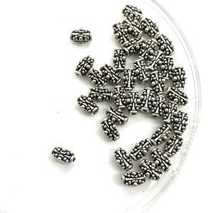 Lot of 9 Sterling Silver Bali Beads